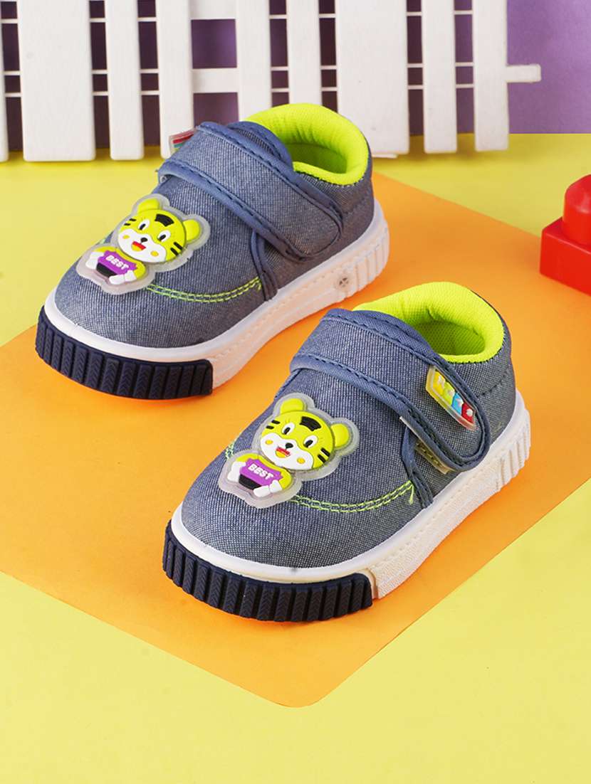 green synthetic sneaker