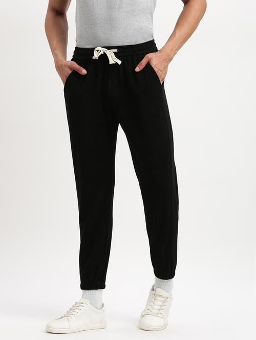 men black solid mid rise jogger - 21276809 - Standard Image - 0