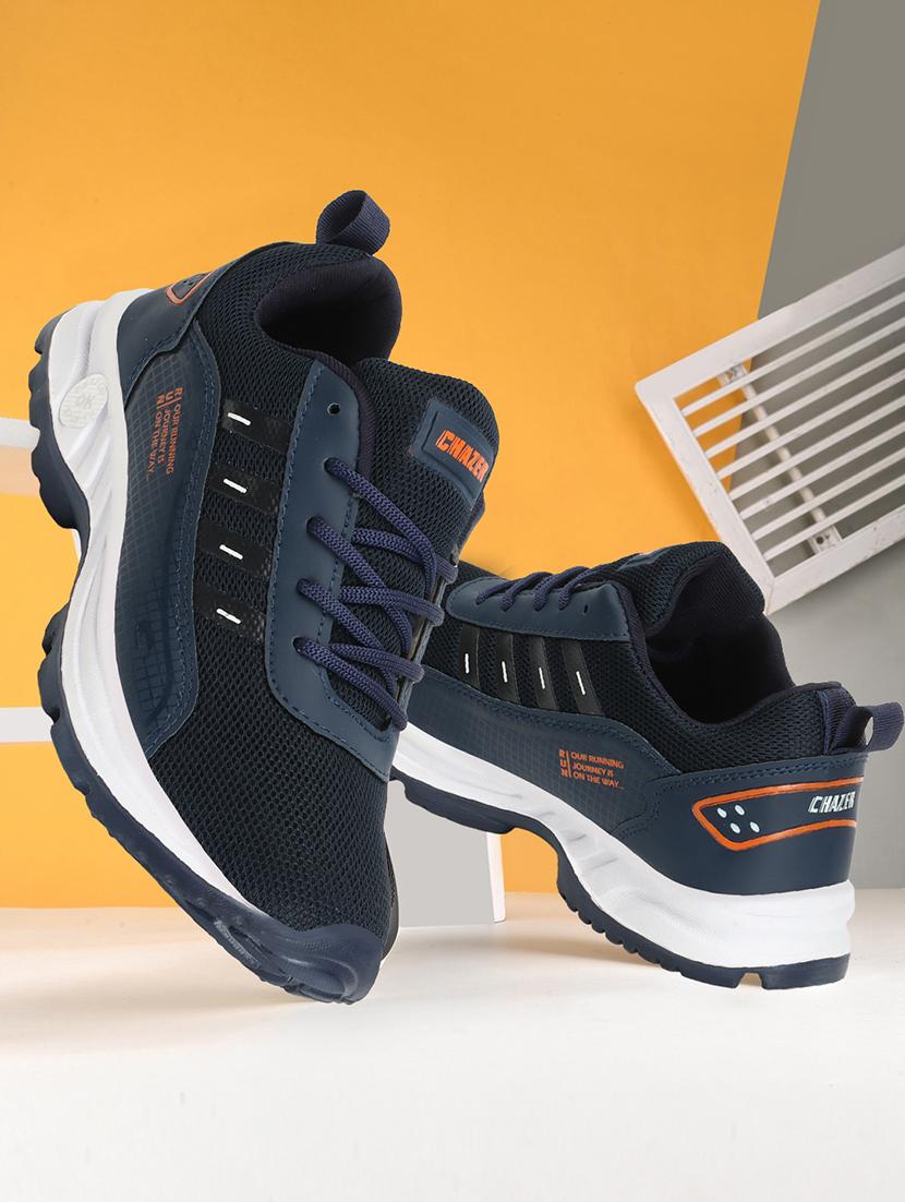 men lace up sports shoes - 21279737 -  Zoom Image - 0