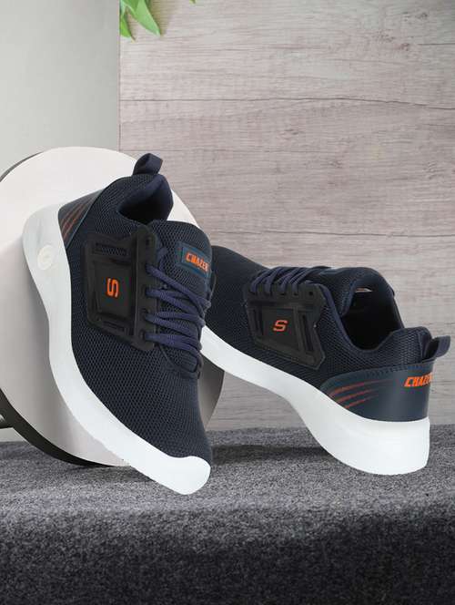 men lace up sports shoes