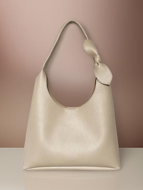 beige leatherette handbag - 21292096 -  Standard Image - 0
