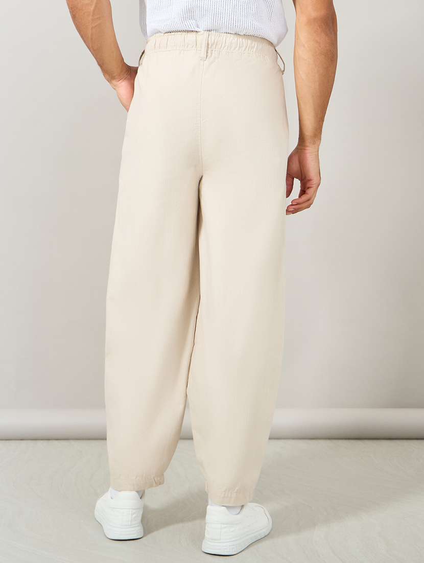 men cream solid joggers - 21307630 -  Standard Image - 1