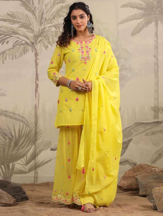 women yellow kurta sharara set with dupatta