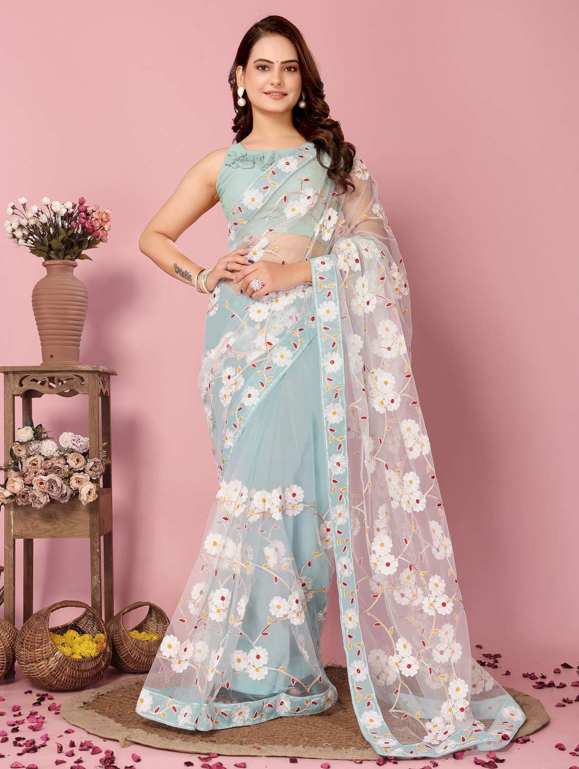 women light blue embroidered saree with blouse