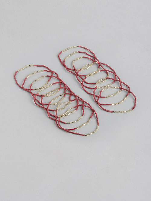 red metal beaded bracelet - 21341475 -  Standard Image - 0