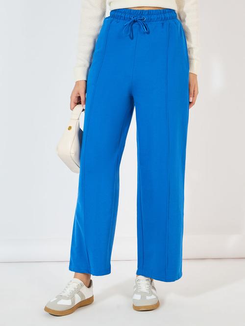women solid high rise relaxed fit track pant - 21390754 - Standard Image - 0