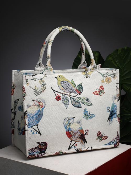off white canvas printed handbag - 21391417 - Standard Image - 0