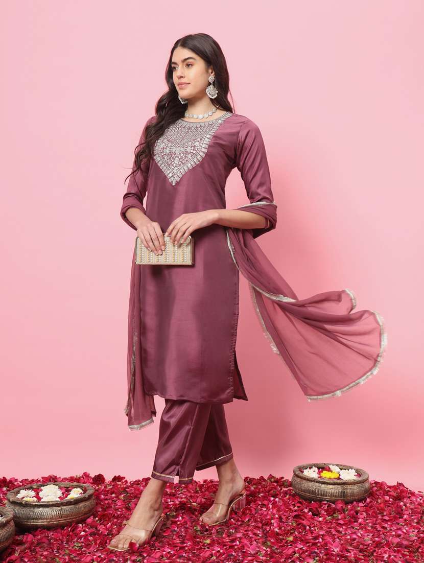 women peach kurta dupatta set