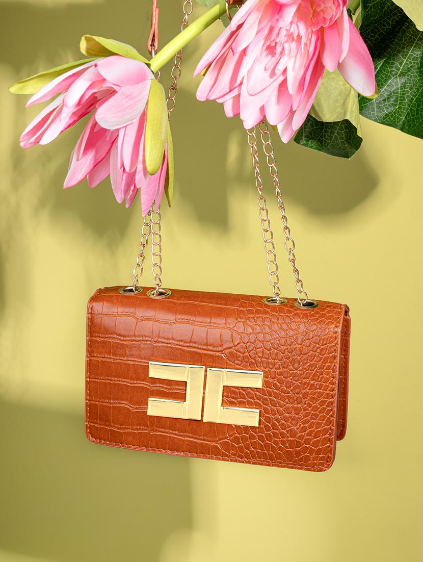 brown textured handbag - 21457081 - Standard Image - 1
