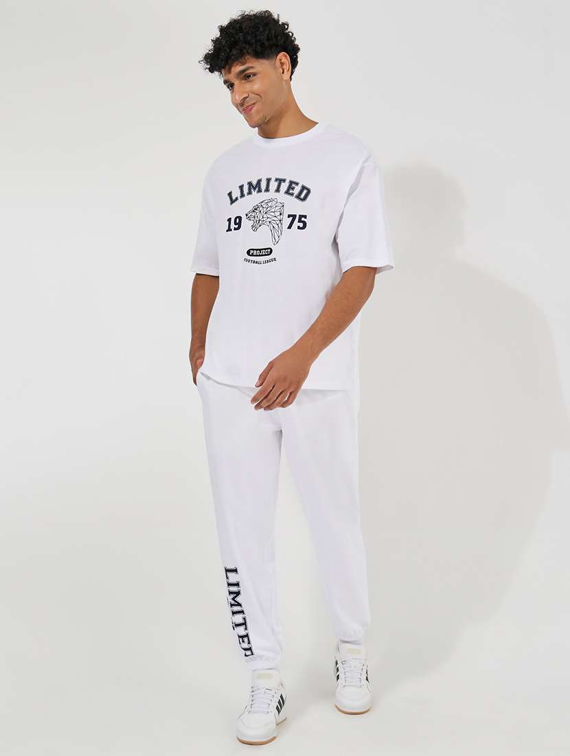 men black typographic print oversized t-shirt & track pant co-ord with side slit