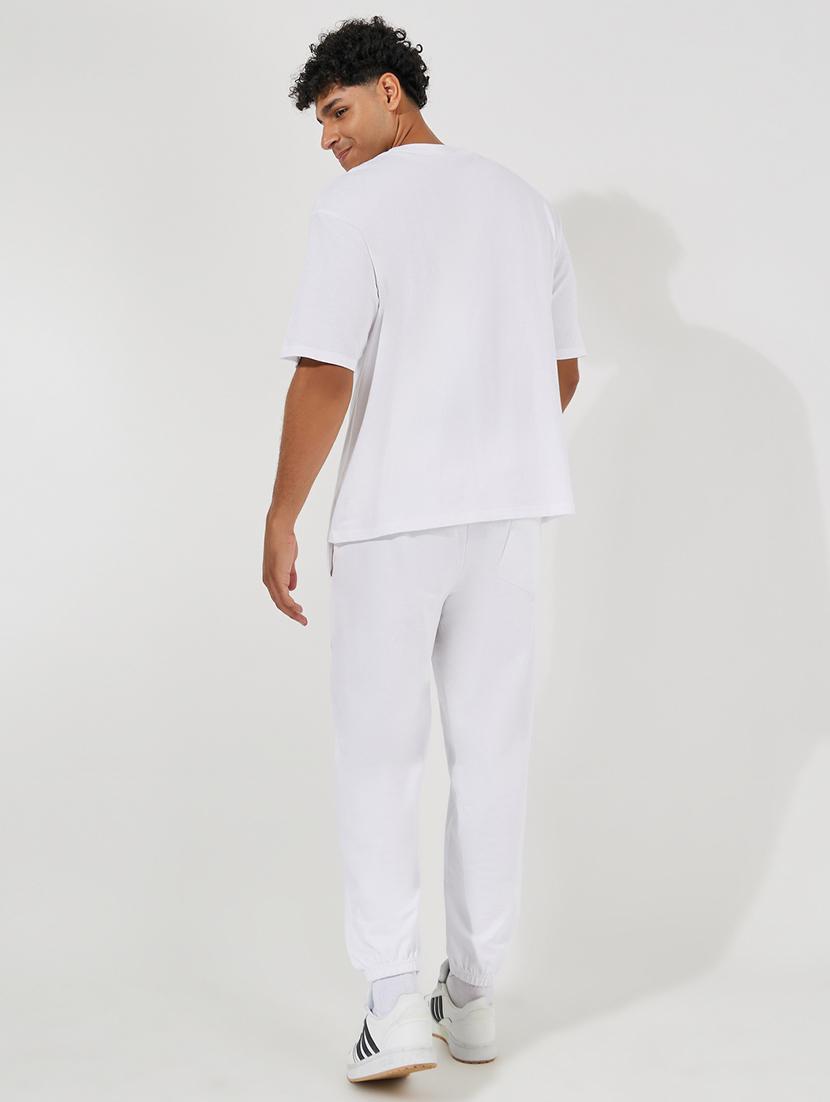 men black typographic print oversized t-shirt & track pant co-ord with side slit - 21457094 - Standard Image - 1