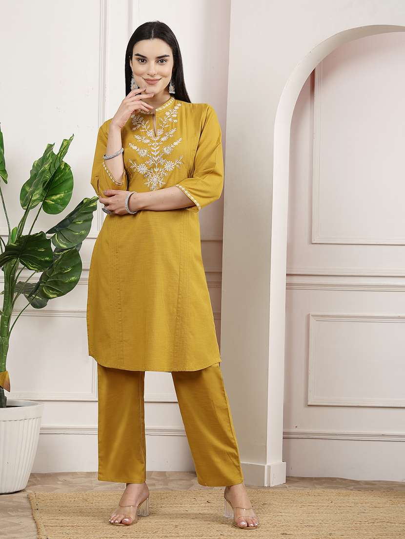 women mustard kurta palazzo set