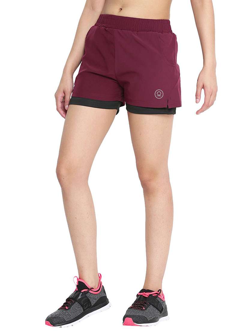 women mid-rise solid sports shorts - 21483976 - Zoom Image - 0