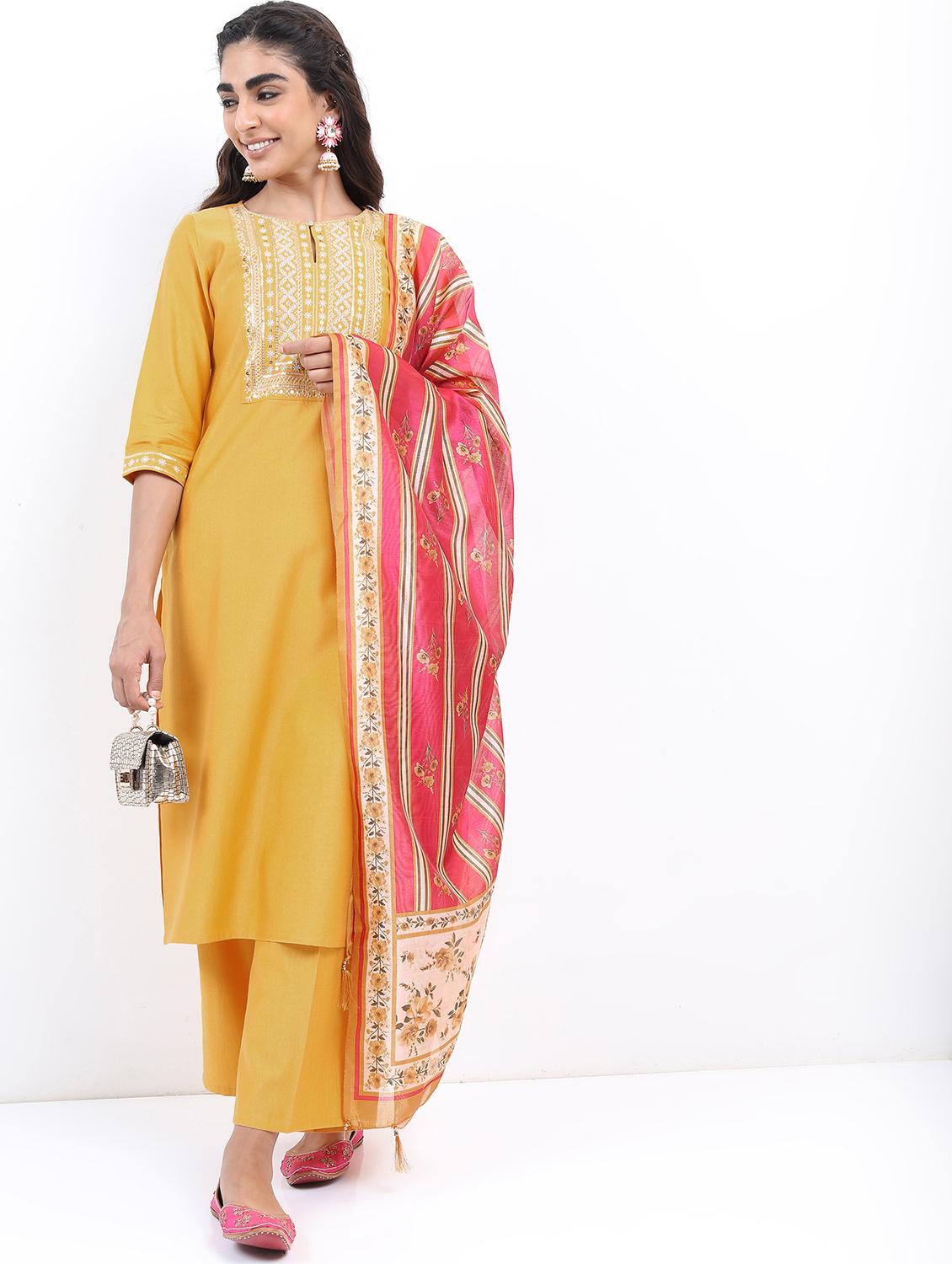 women yellow kurta pant set with dupatta
