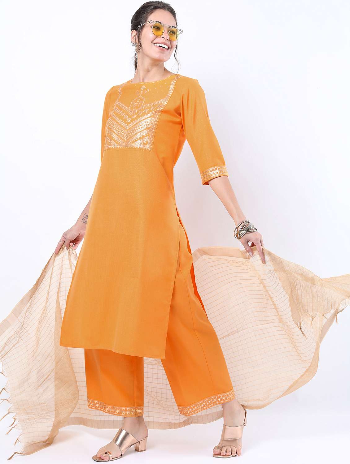 women orange kurta palazzo set with dupatta