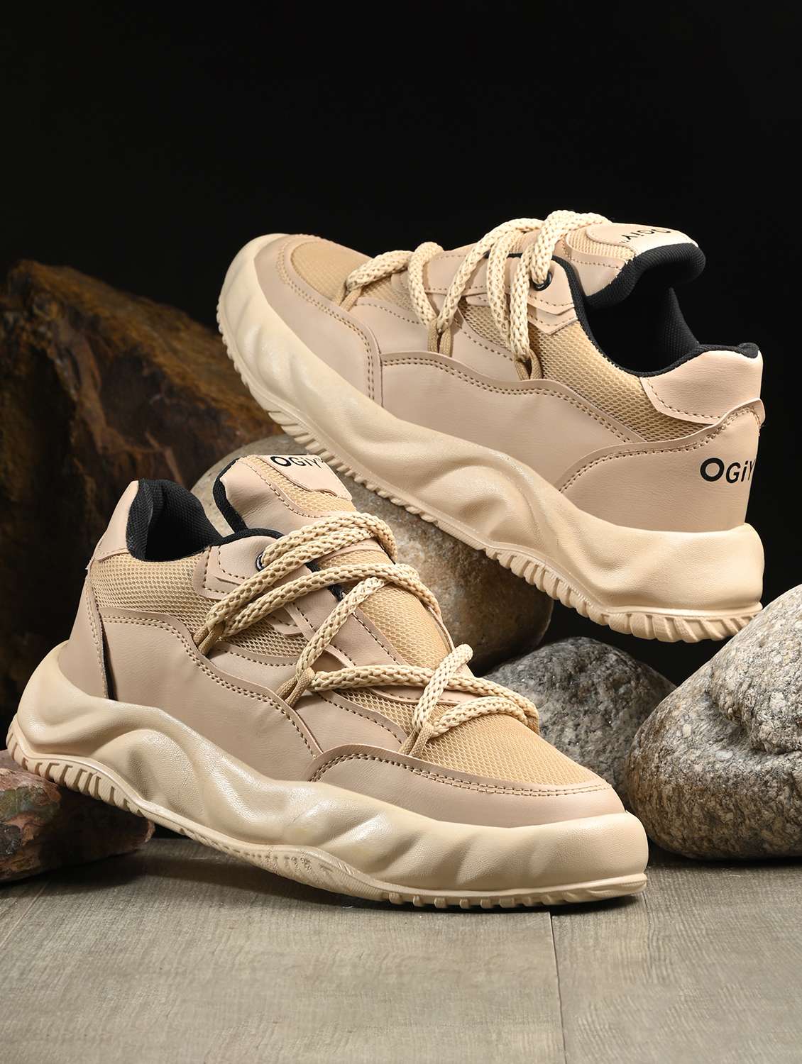 men lace up sports shoes