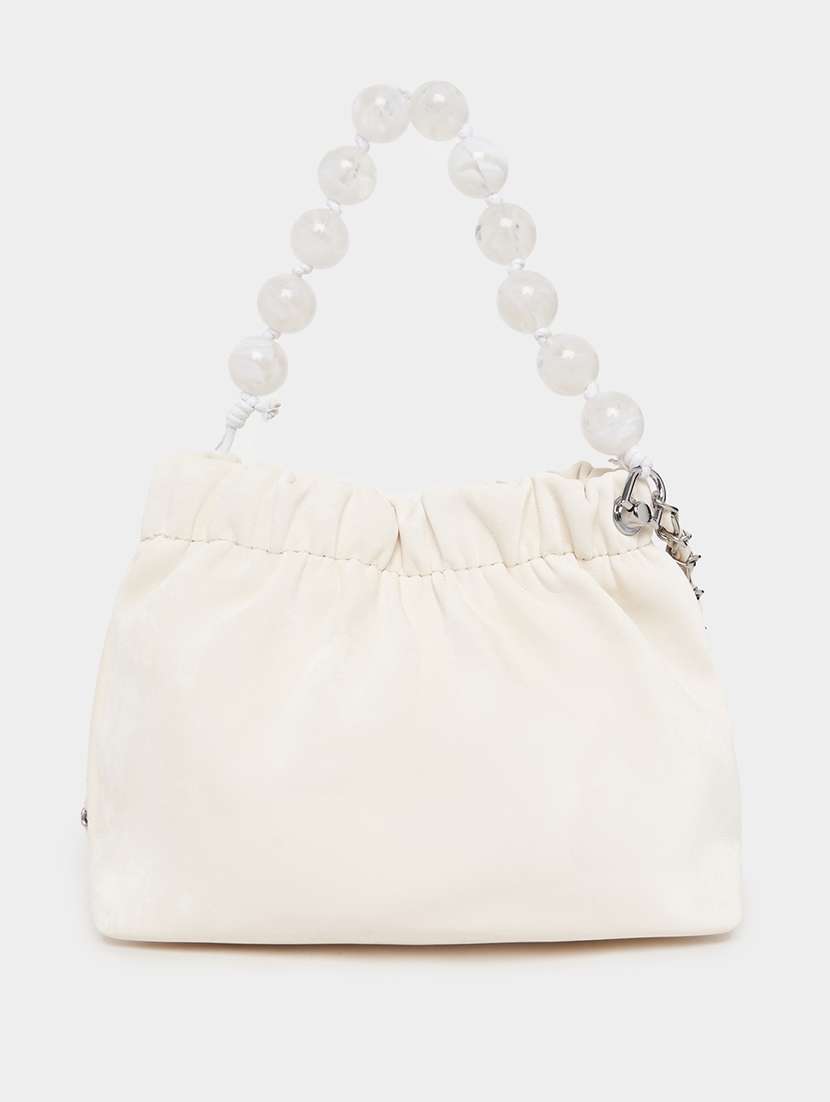 women cream solid handbag - 21505973 -  Standard Image - 1