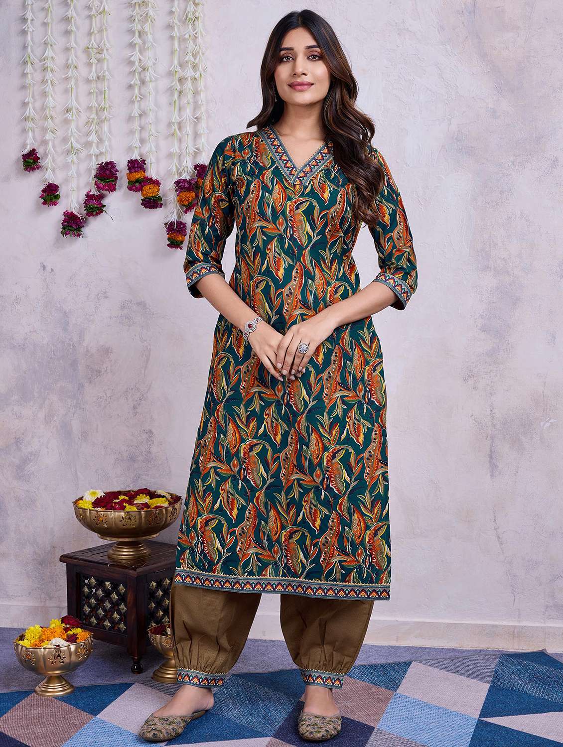 women teal printed v neck kurta salwar set