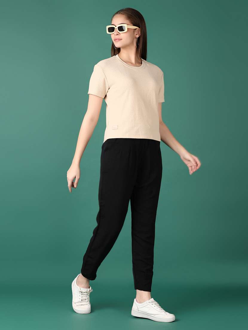 women black solid ankle length peg trousers - 21529837 -  Standard Image - 4