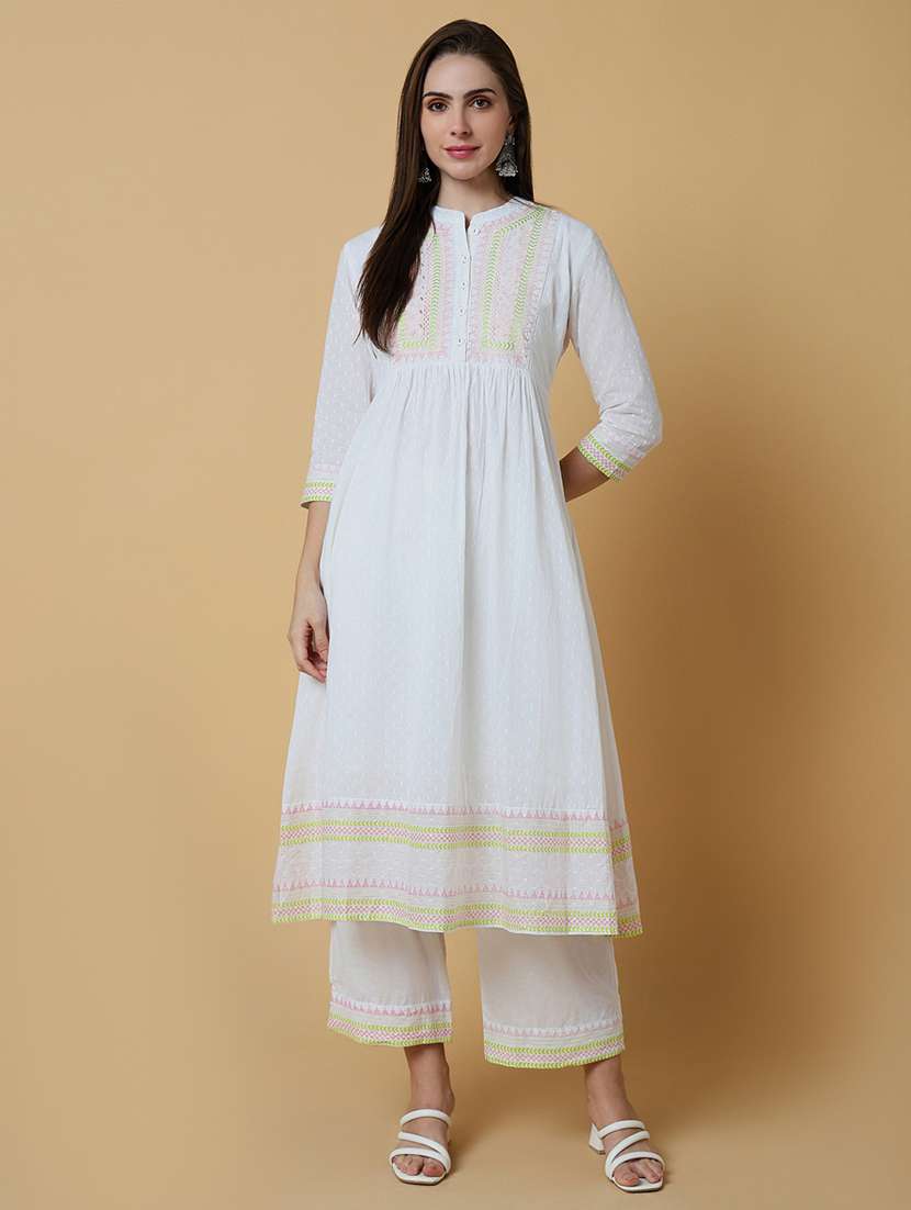 women embroidered kurta palazzo set
