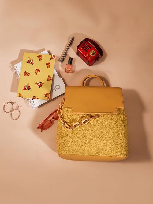 yellow textured leatherette backpack - 21562335 -  Standard Image - 0