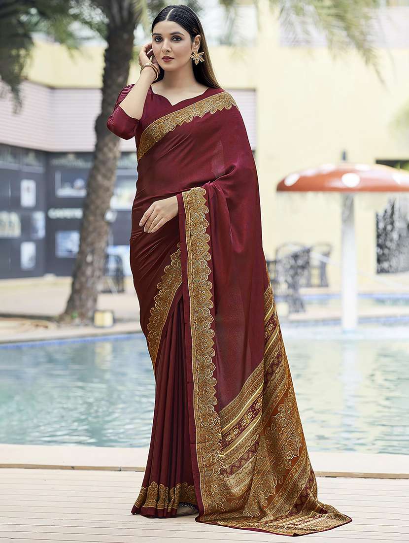 women maroon solid bordered saree