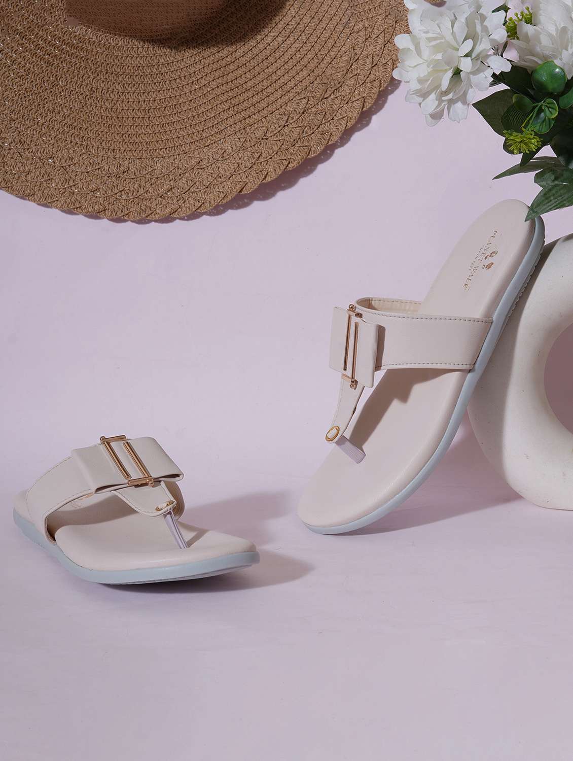 women cream slip on sandal