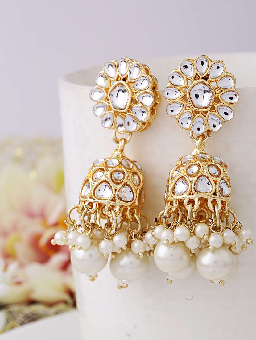 women gold jhumka earrings