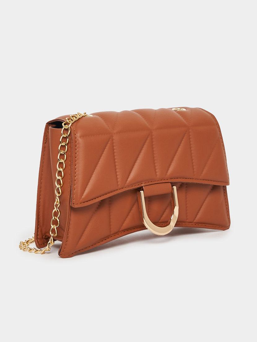women white textured sling bag - 21631989 - Zoom Image - 0