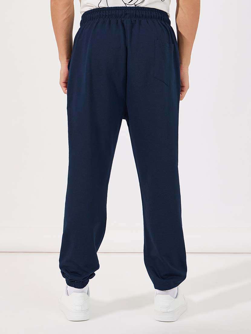 men mid rise placement print joggers - 21643846 - Standard Image - 1