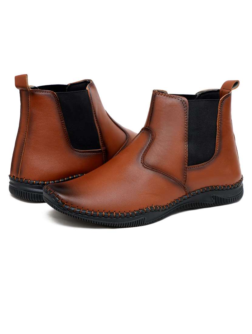 men tan slip on boots - 21647363 -  Standard Image - 1