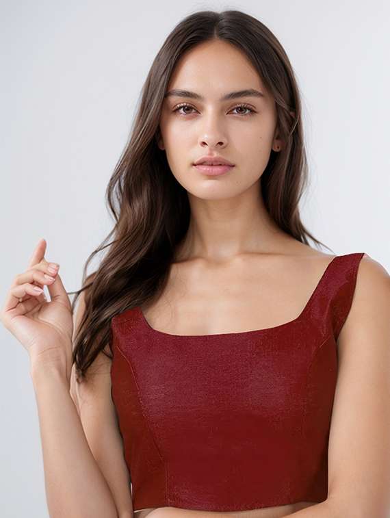 women solid sleeveless stitched blouse