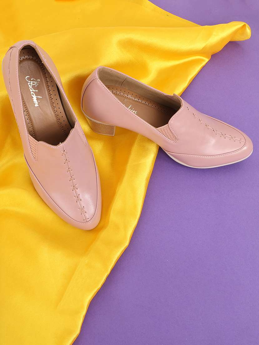 women pink slip on pump