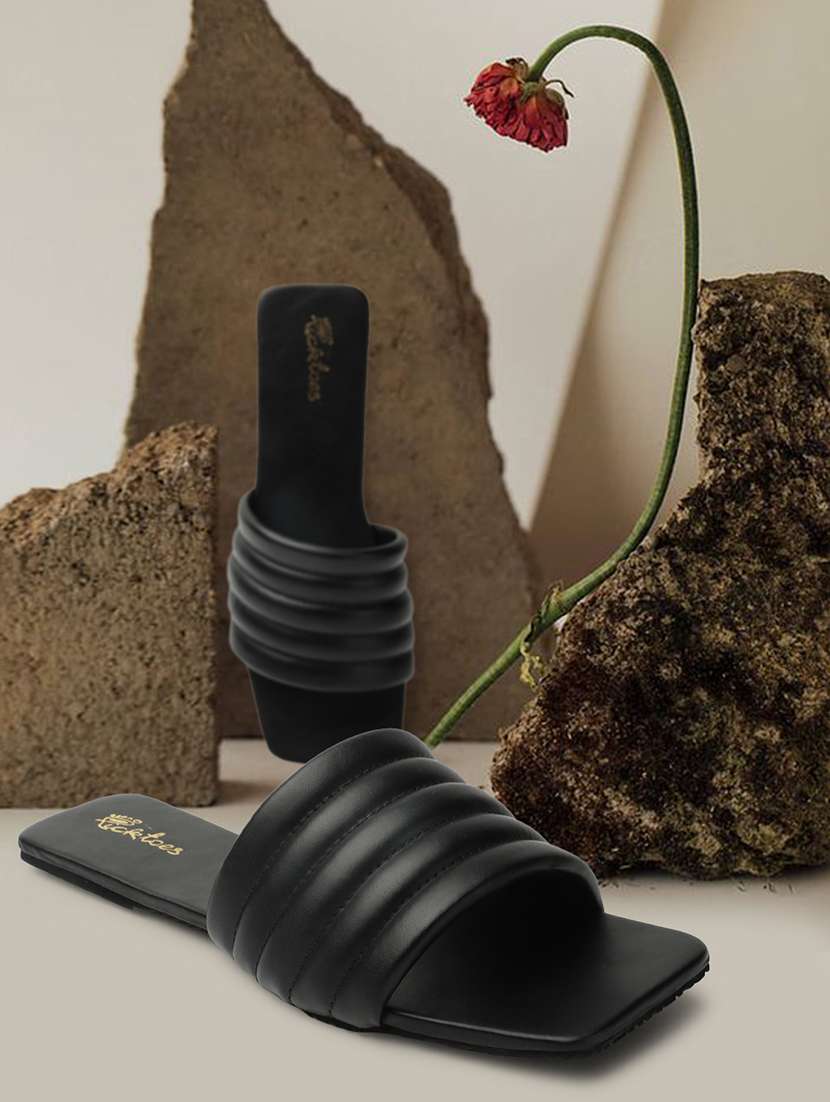 women slip on flat sandal