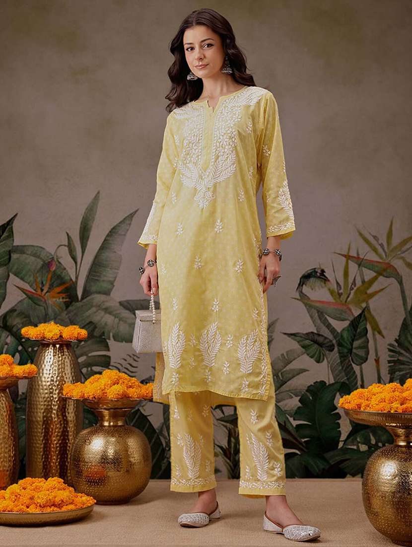 women solid with work notch neck kurta set