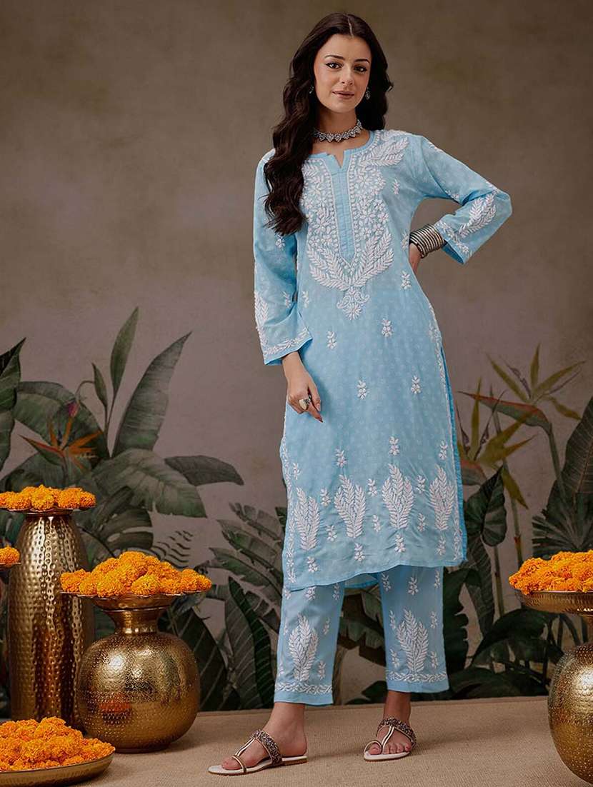women solid with work notch neck kurta set