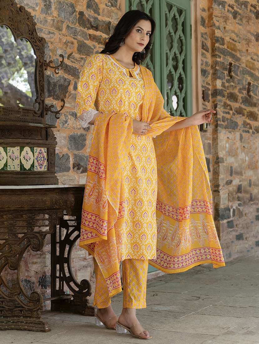 women yellow printed key hole neck suit set