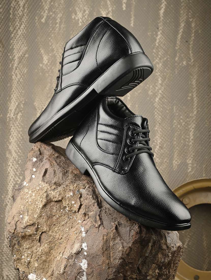 black synthetic lace up boots
