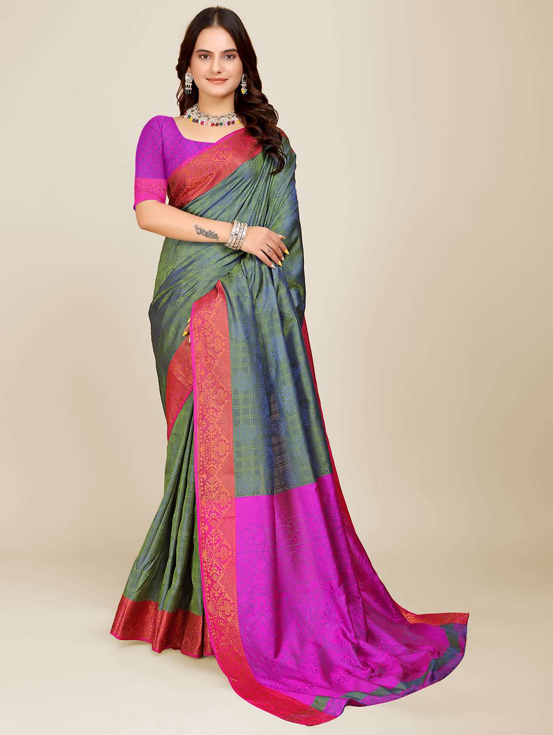 women self design bordered saree