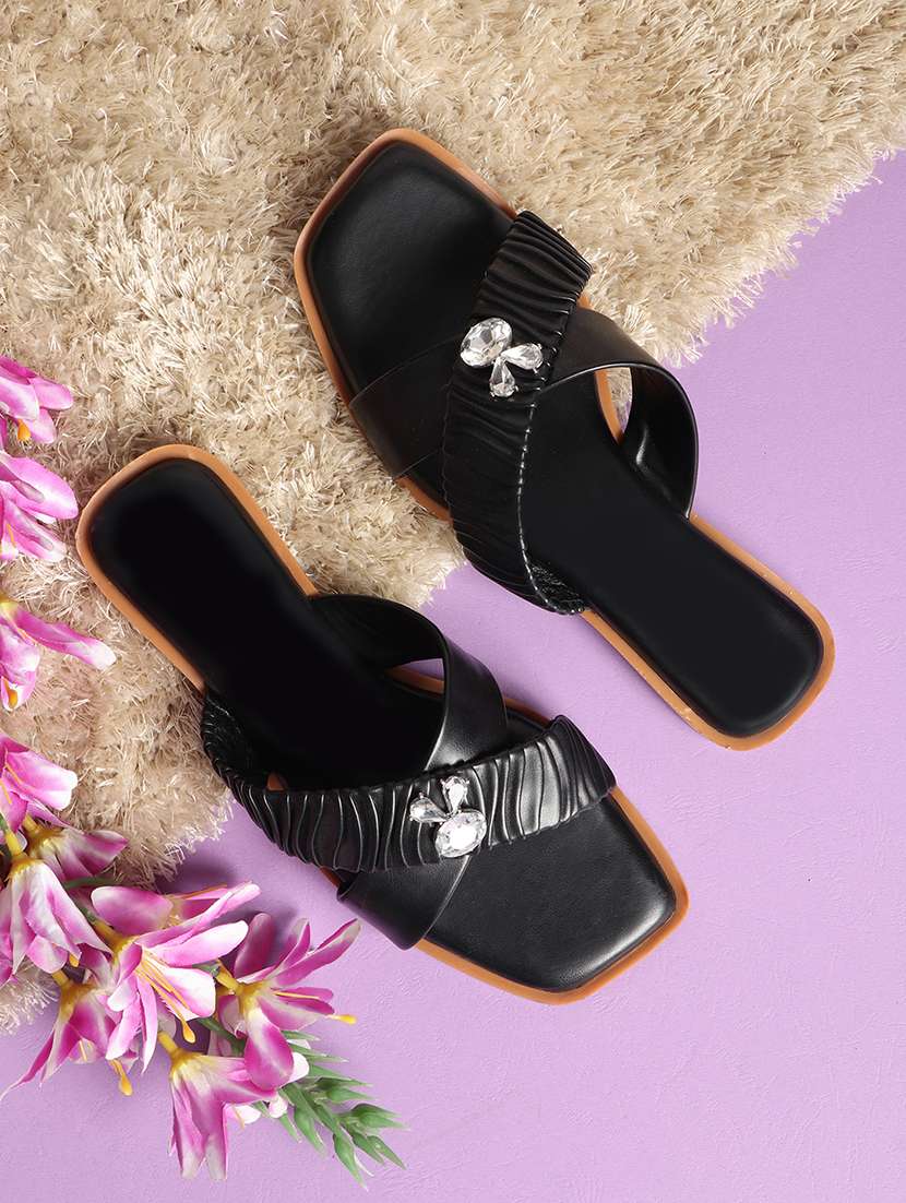 black synthetic slip on sandals