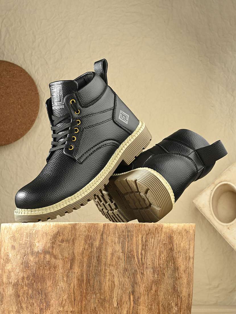 black synthetic lace up boots