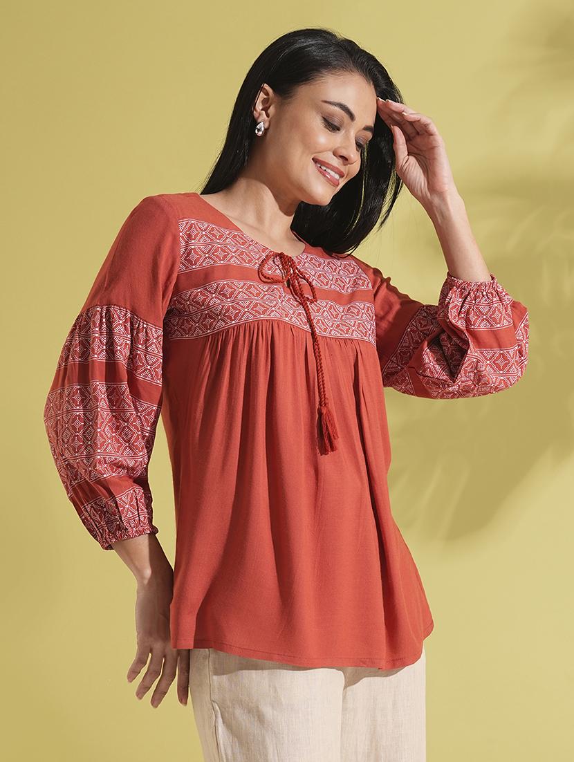 globus women rust tie-up round neck bishop sleeves ethnic print gathered a-line workwear tunic - 21704493 -  Standard Image - 1