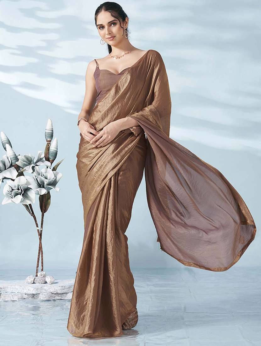 women brown solid saree with blouse