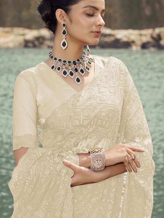 women solid with work embroidered saree with blouse - 21708483 - Standard Image - 1
