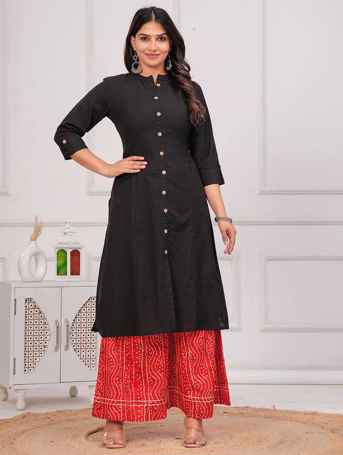 women solid three quarter sleeve a-line kurta