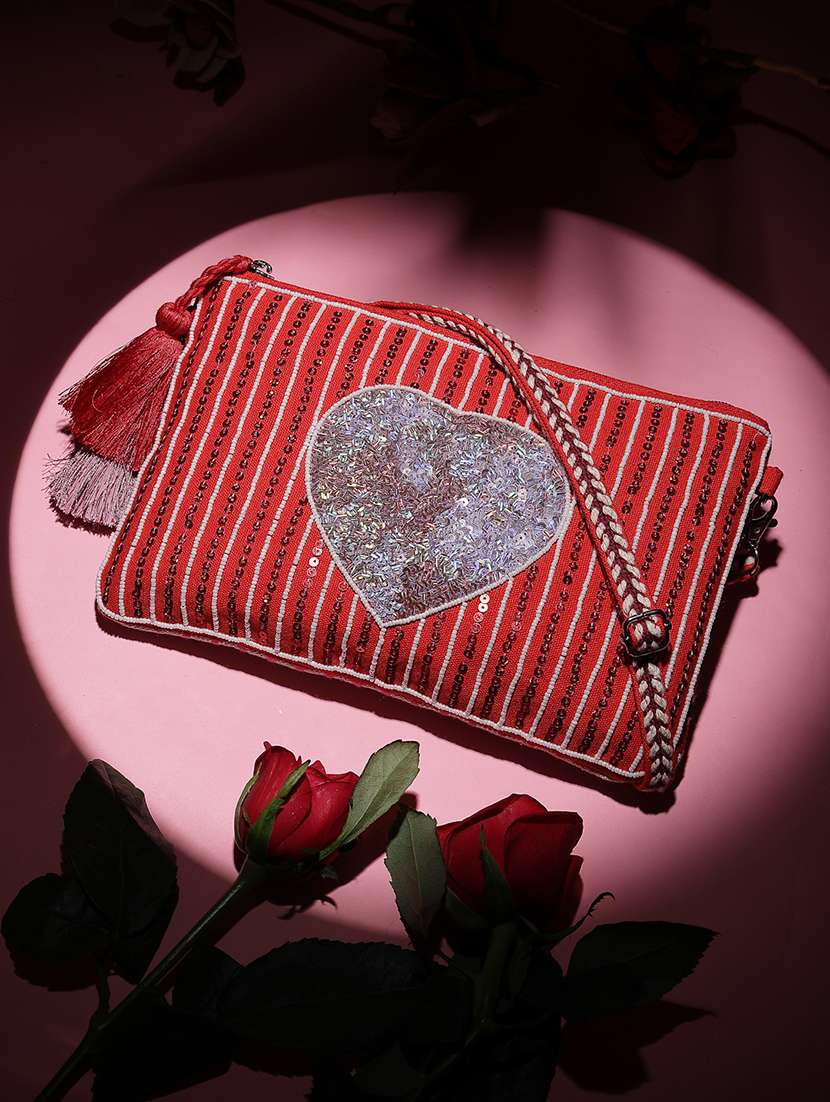 women red sequined sling bag