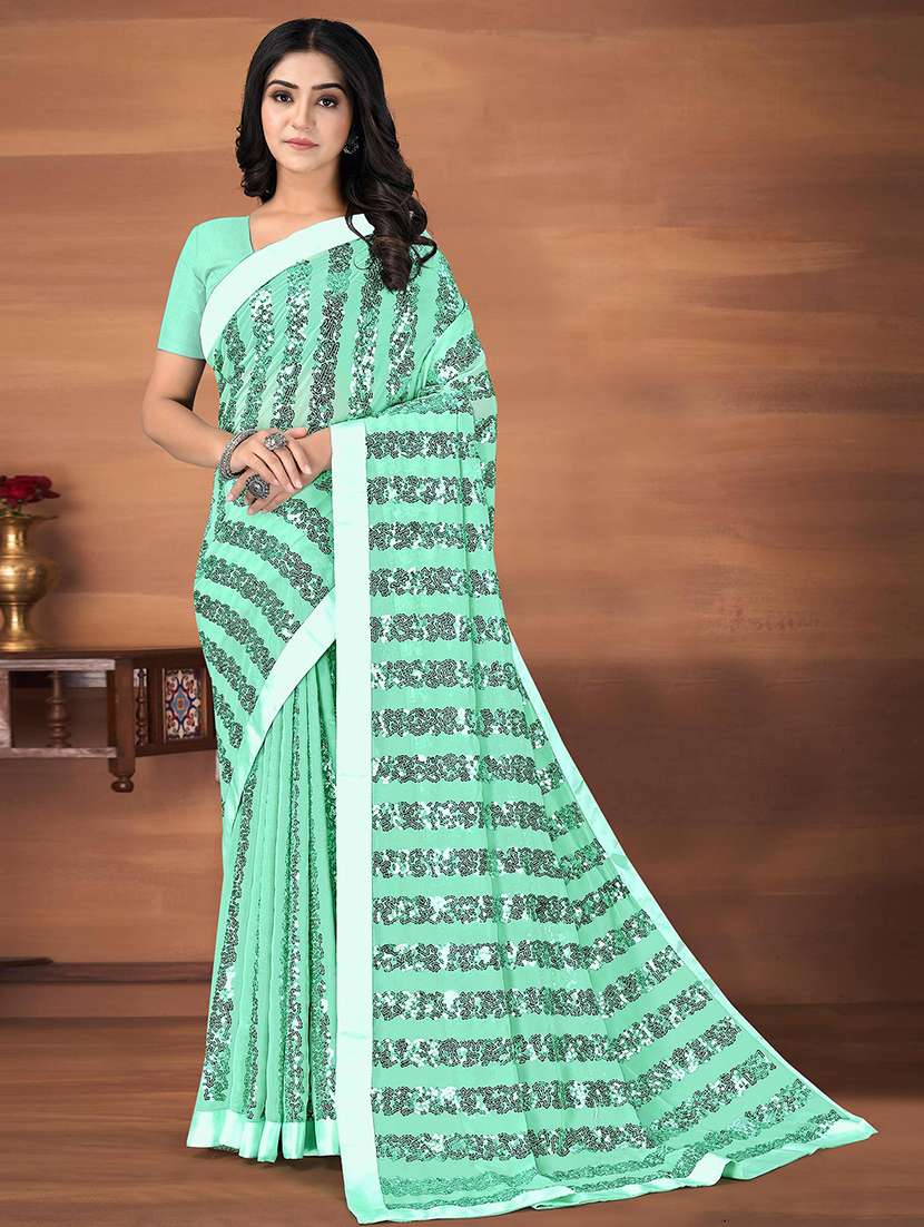 women green printed saree with blouse