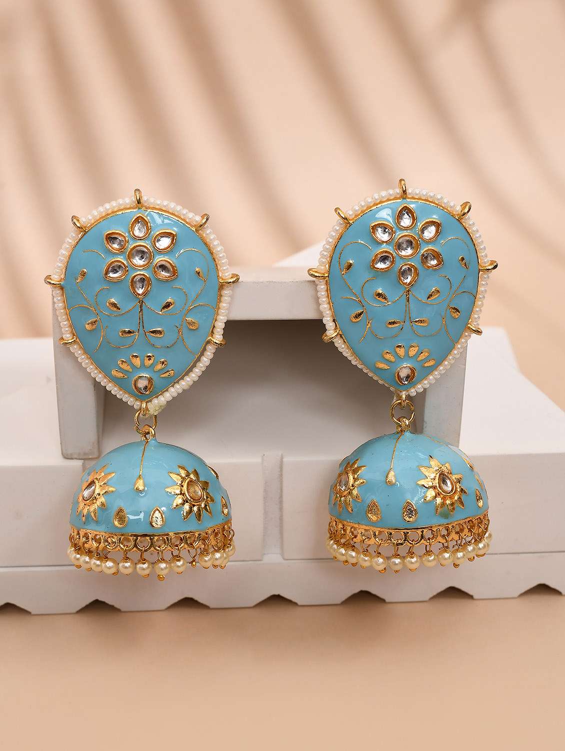light blue & gold-plated dome shaped kundan stone jhumkas earrings