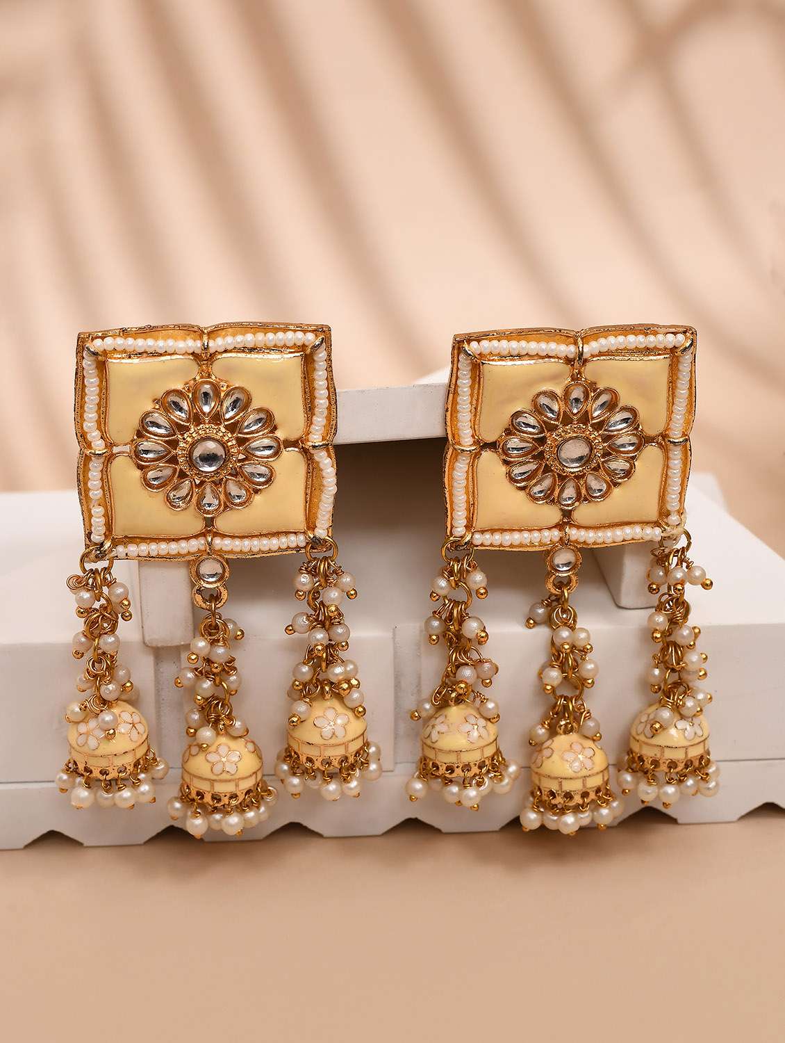 cream stone square top floral carved jhumka earrings