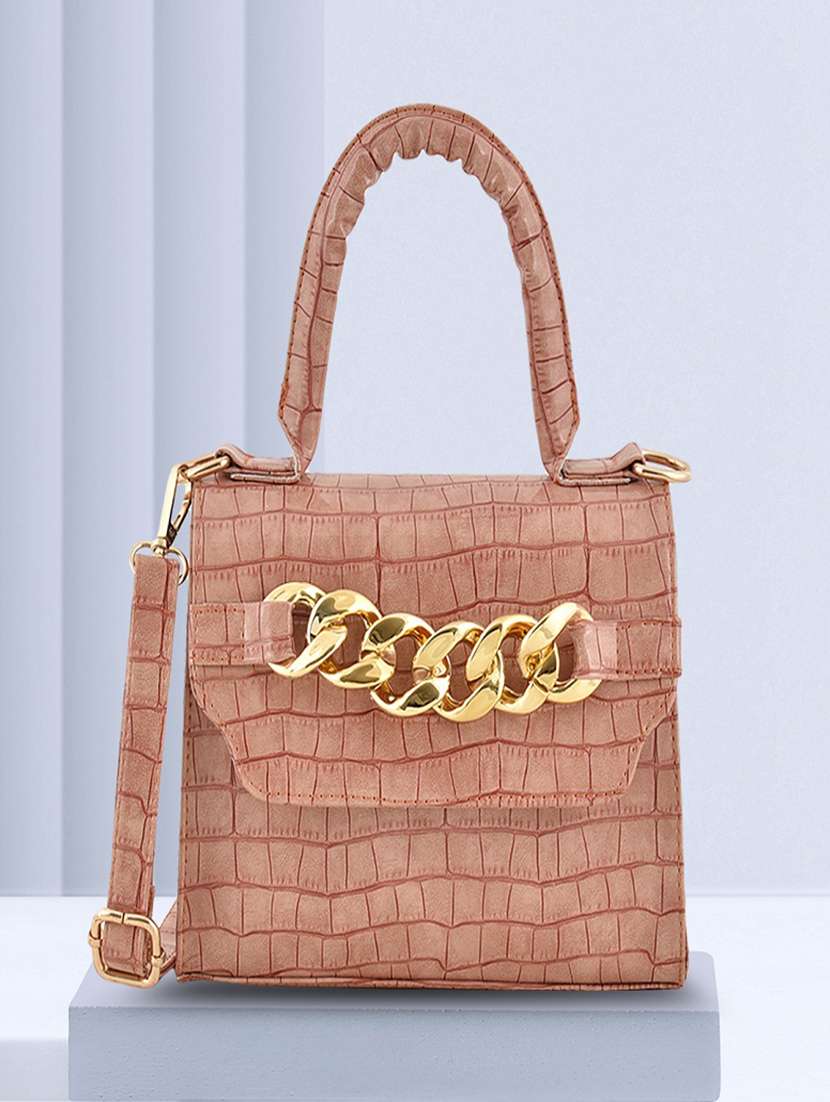 women pink textured sling bag